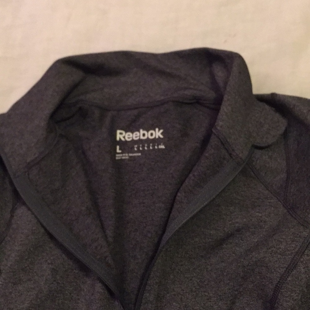 Reebok tight fitted workout jacket